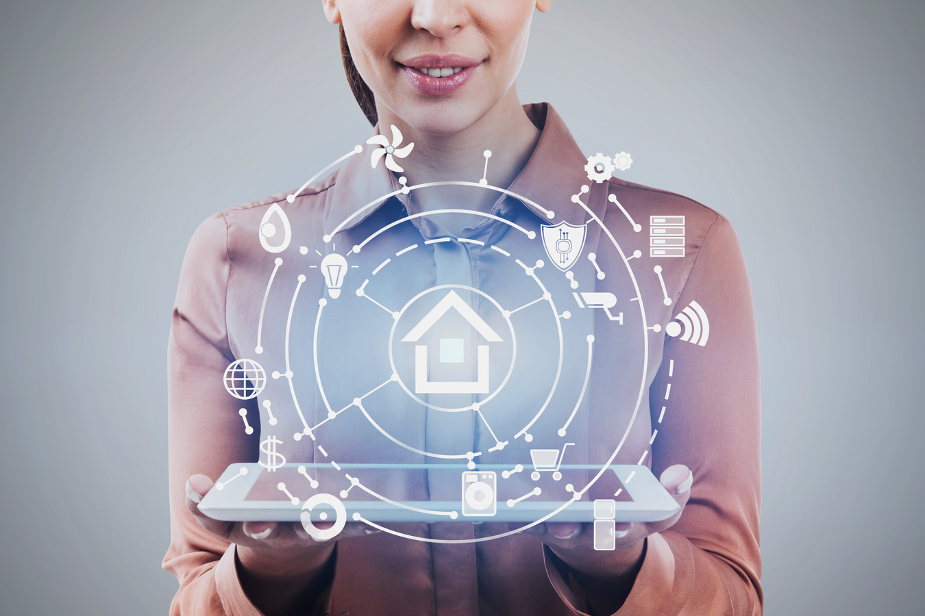 Woman holding tablet, smart home technology